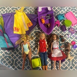 Barbie Adventure Set with Purple Boat and Colorful Outfits